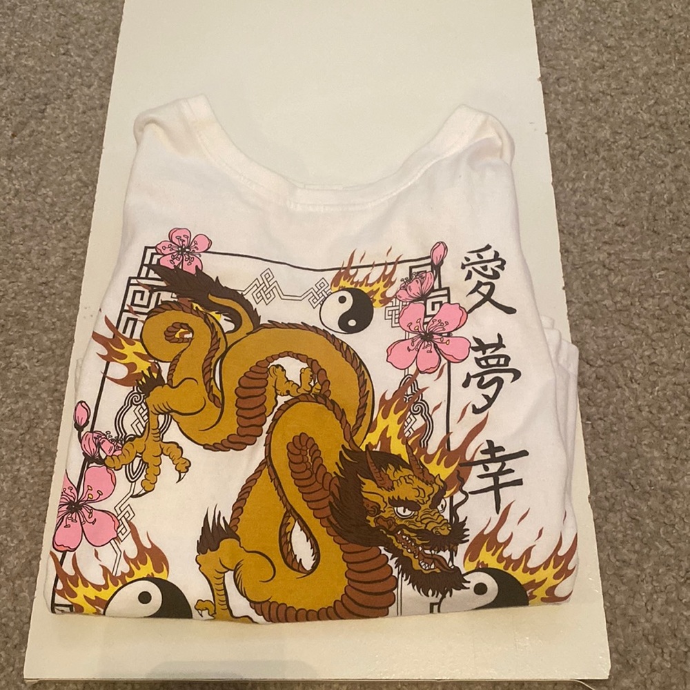 It’s a golden dragon and pink flowers